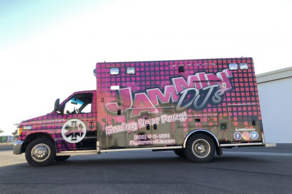 Custom graphics on a pink car wrap