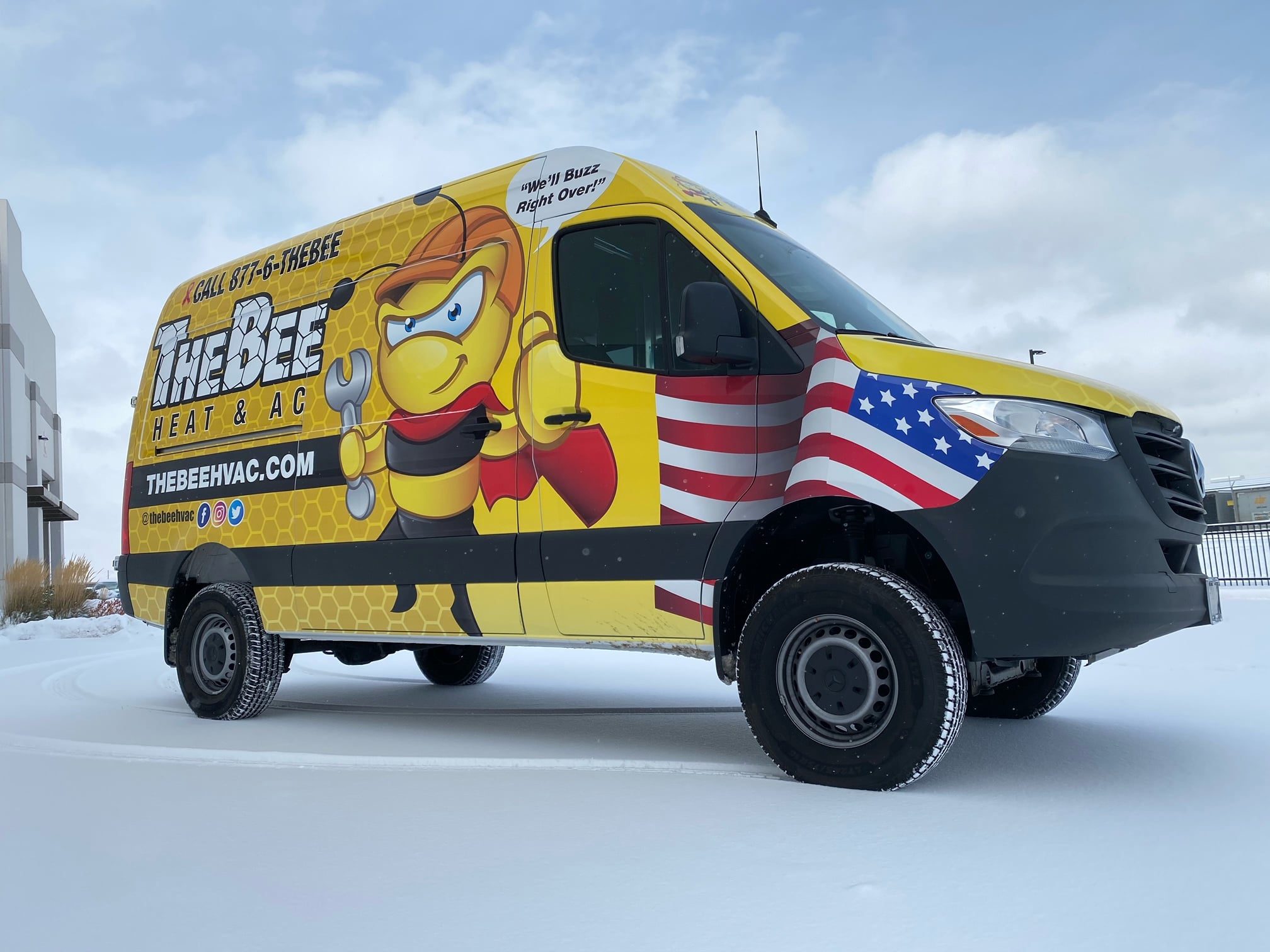 Custom yellow wrap on work van
