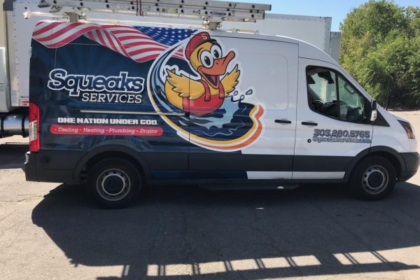 Partial vehicle wrap on a white van